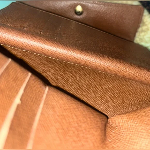 LOUIS VUITTONPortefeuille Alexandre Trifold Wallet w/ Dust Bag.